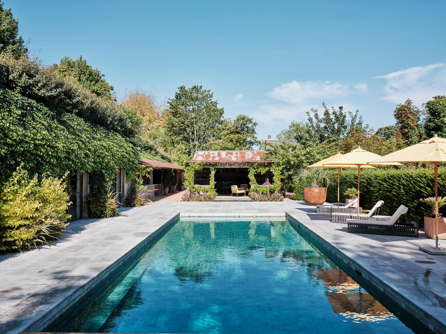 Pool and established gardens at A Garden Retreat